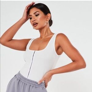 White hook and eye scope thong bodysuit